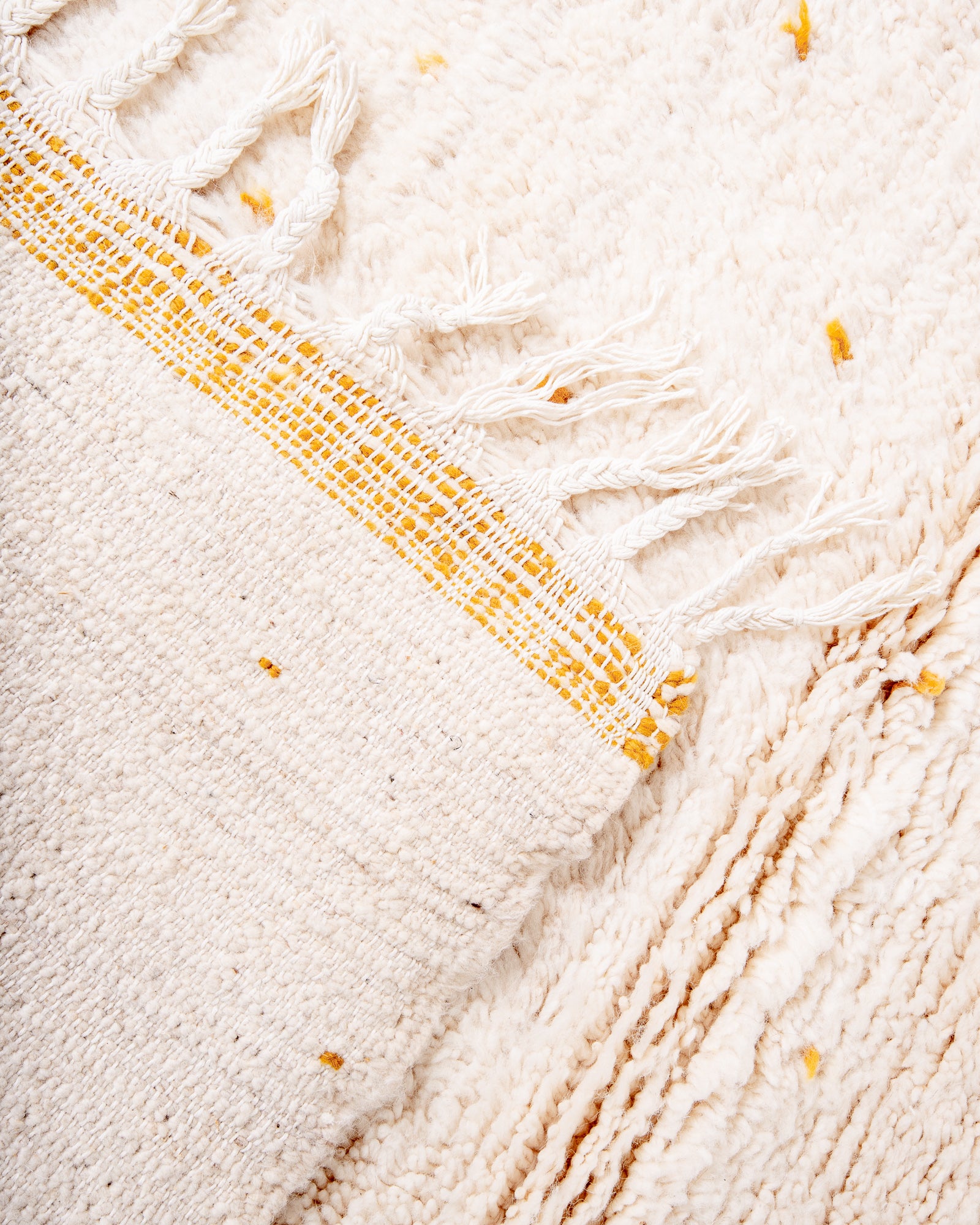 Modern, designer, handcrafted Berber rug from Morocco. Beniourain carpet with beautiful colours and patterns and fluffy wool texture.